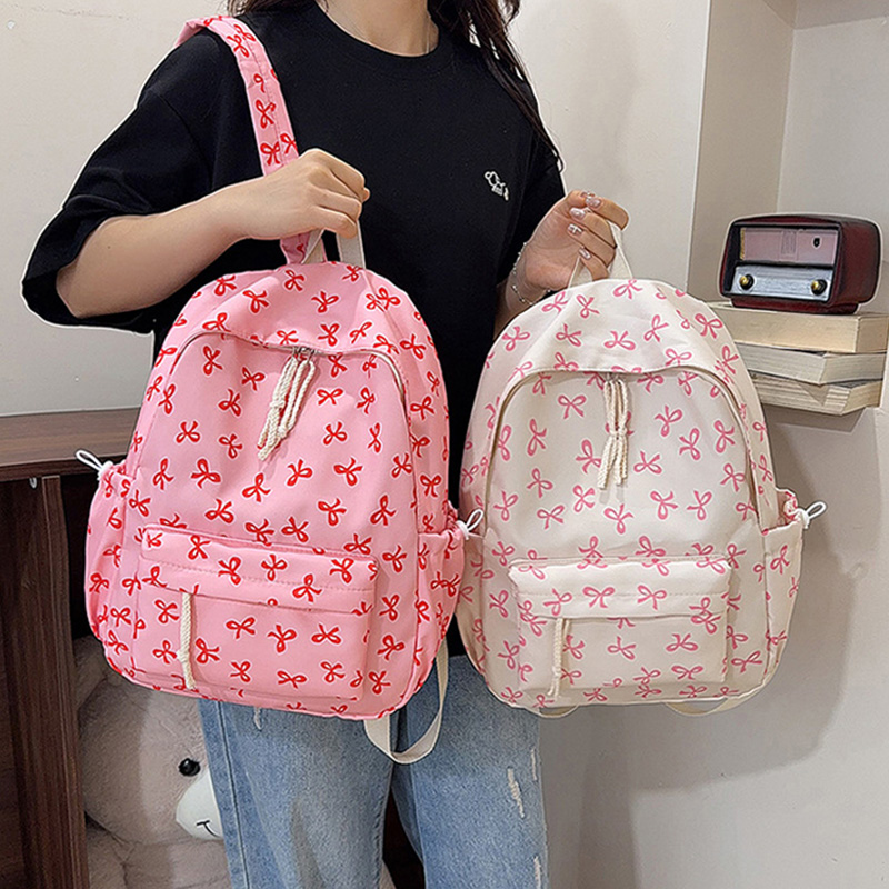 حقيبة ظهر لطيفة بطبعة فيونكات  - مراجعة School Backpack Teen وسعره