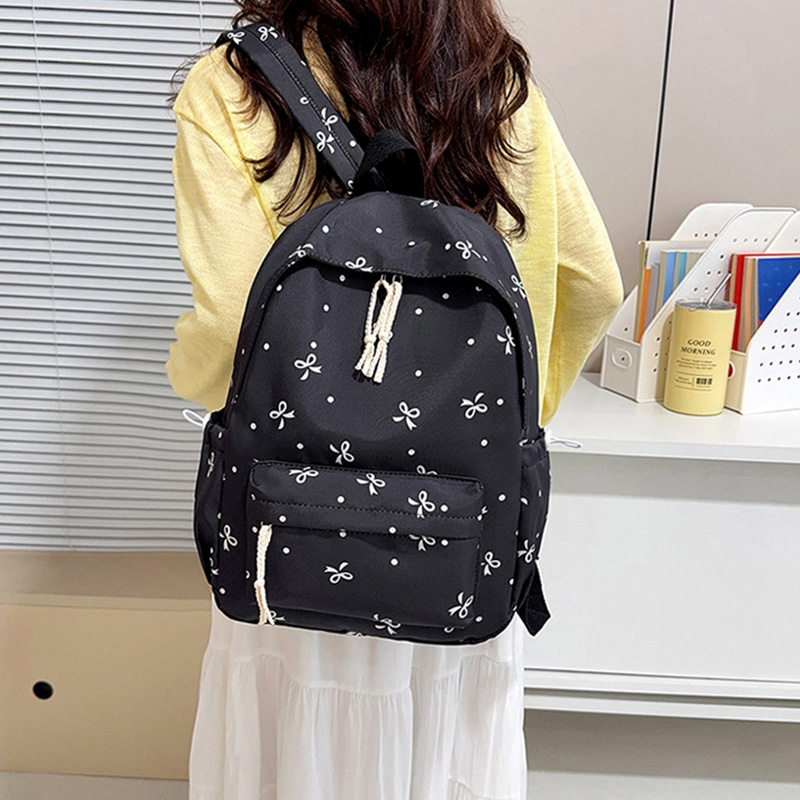 حقيبة ظهر لطيفة بطبعة فيونكات  - مراجعة School Backpack Teen وسعره